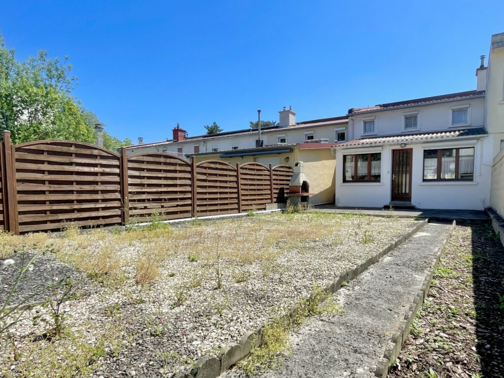 Quartier Remicourt – Maison avec garage et accès véhicules,